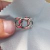Minimal knotted silver ring adjustable