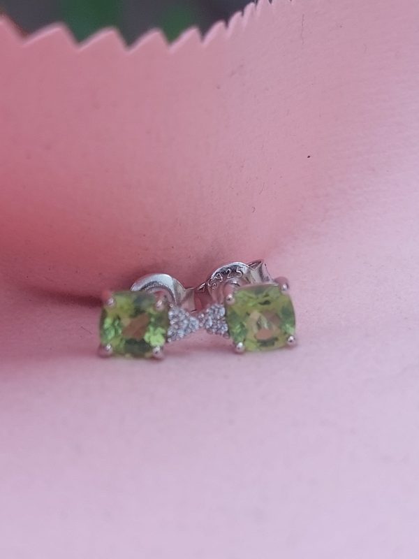 Italian design peridot gemstone earstud close-up